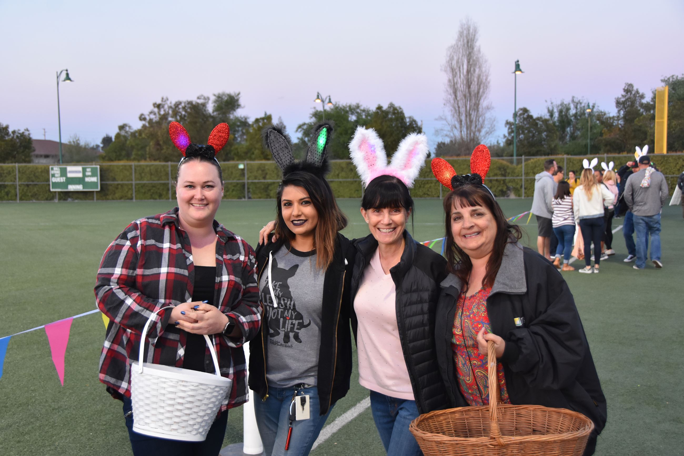 Group poses for picture at Adult Easter Egg-Scramble.